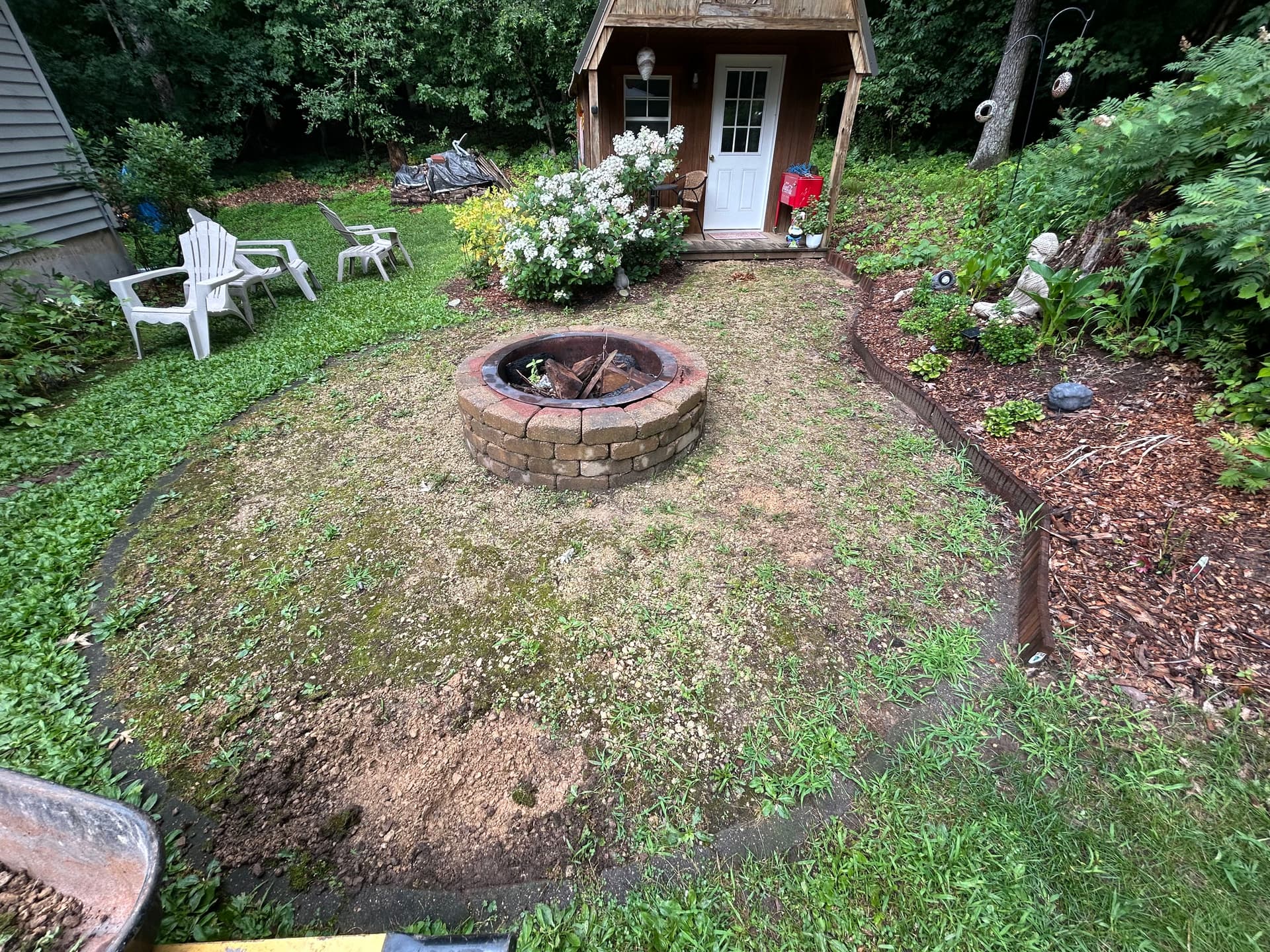Gallery photos for Fire Pit Area Facelift with Blue Granite Boulders and Fresh Gravel: Image #1