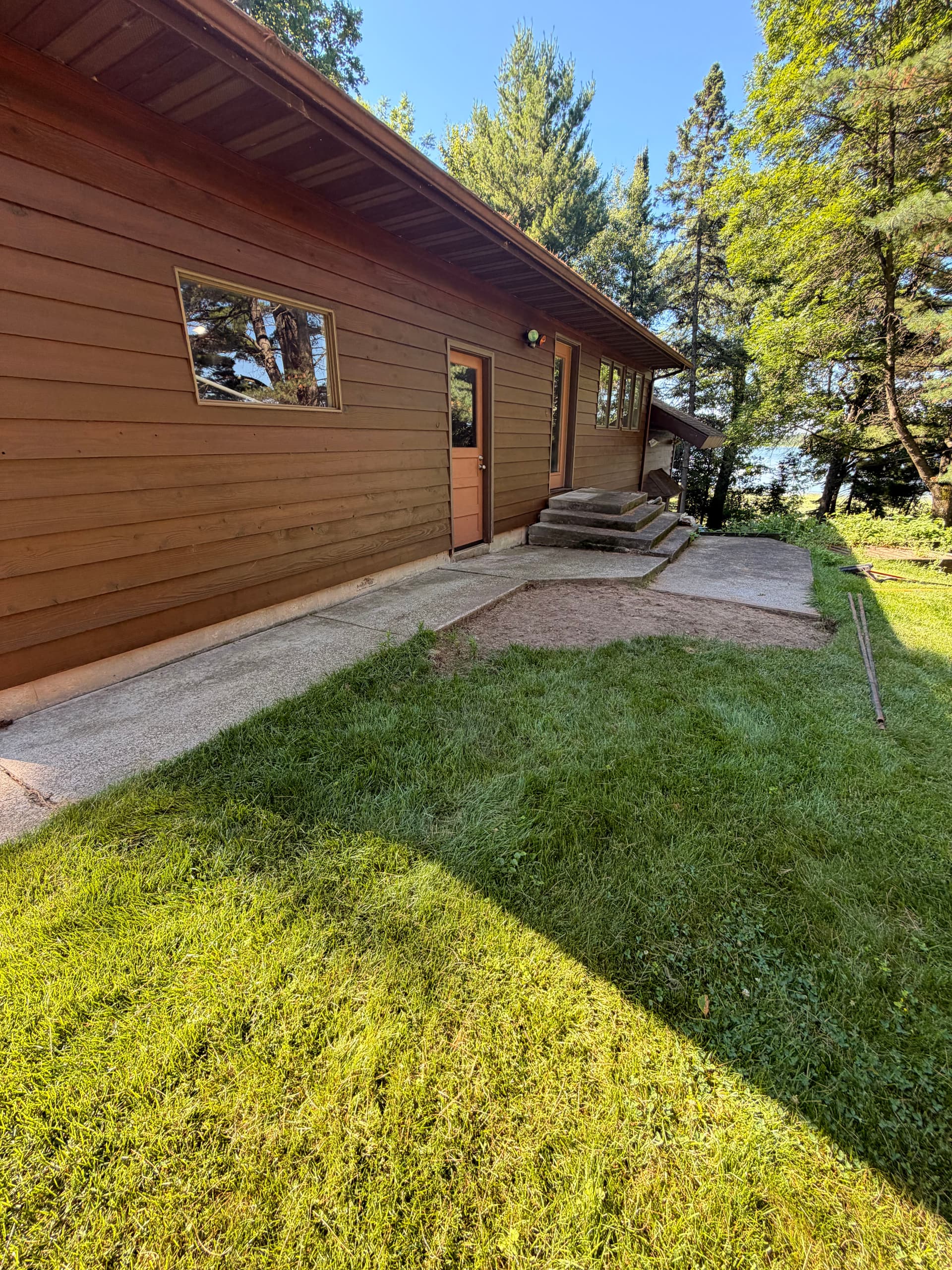 Gallery photos for Paver Patio, Walkway and Boulder Retaining Wall in Bloomer: Image #4