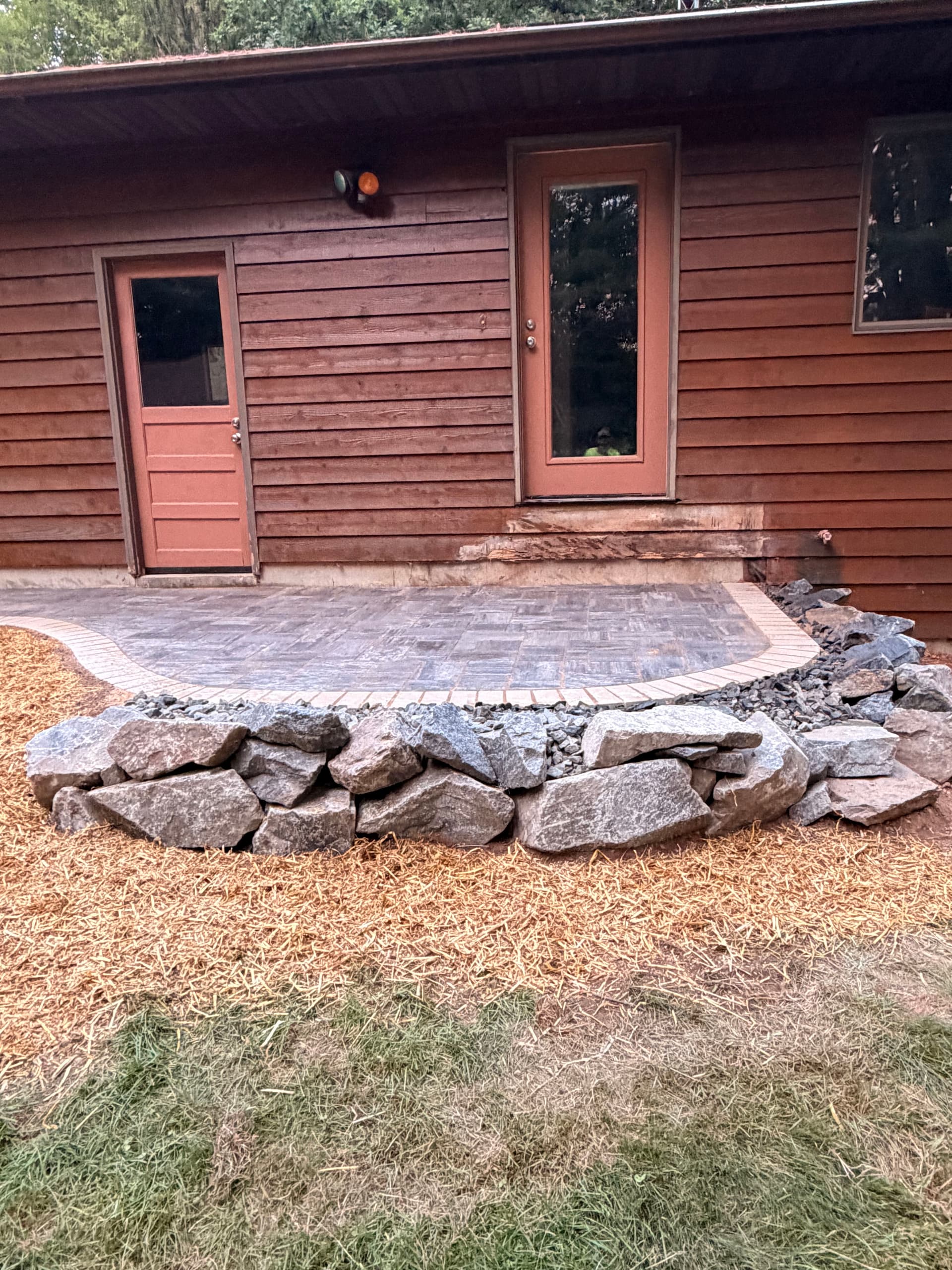 Gallery photos for Paver Patio, Walkway and Boulder Retaining Wall in Bloomer: Image #1