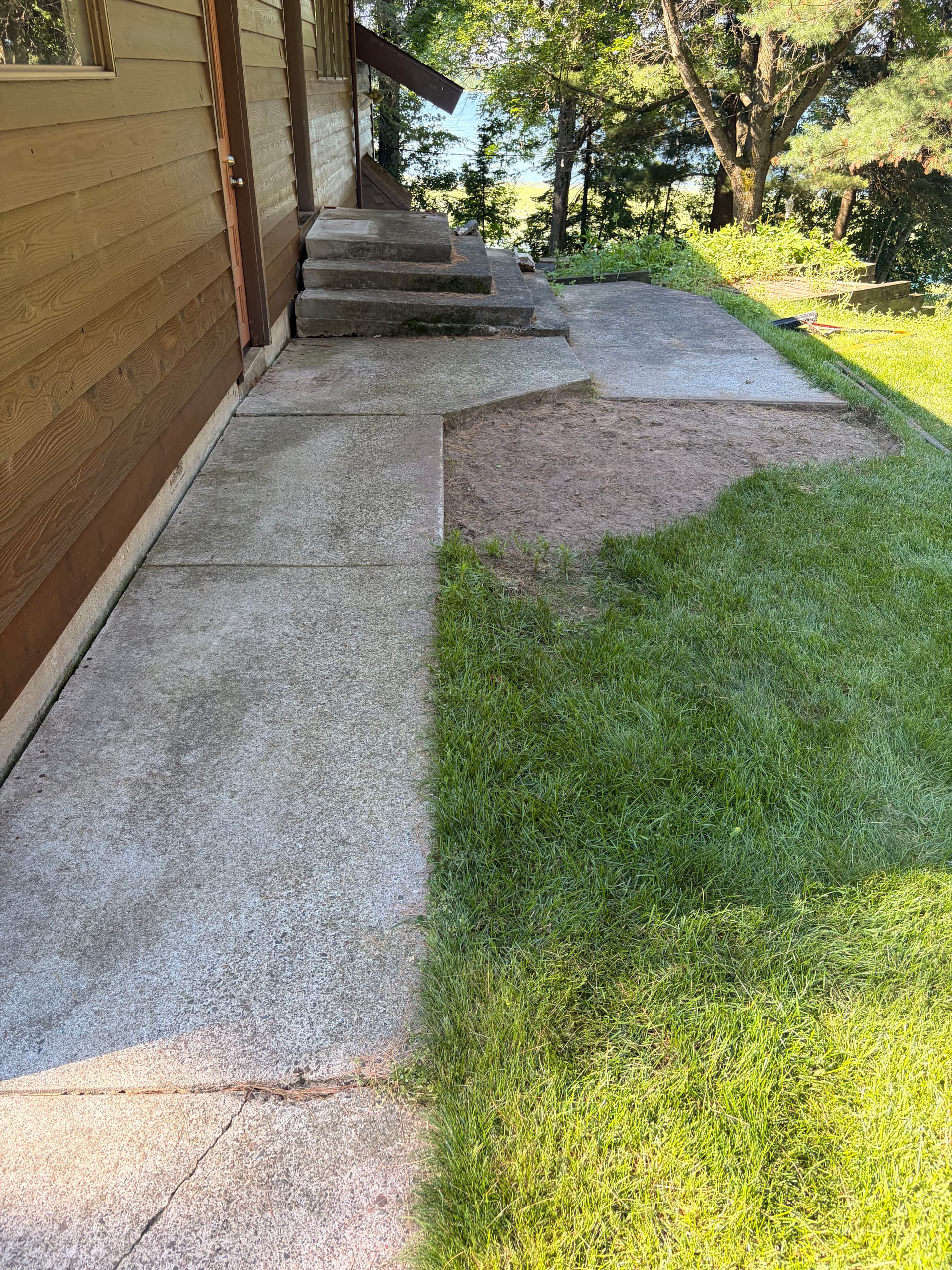 Gallery photos for Paver Patio, Walkway and Boulder Retaining Wall in Bloomer: Image #3