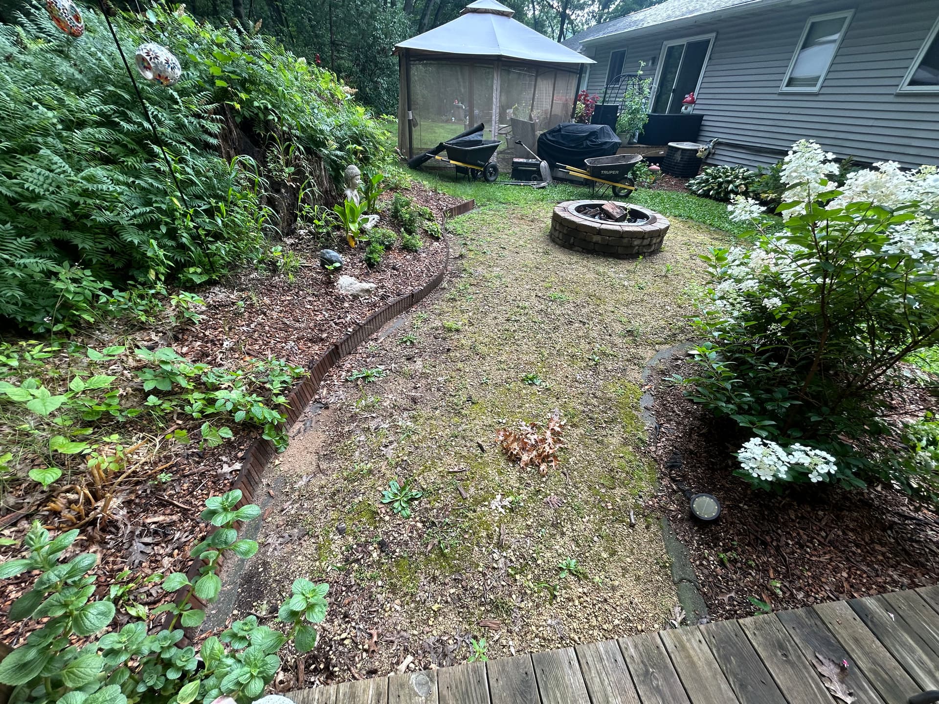 Gallery photos for Fire Pit Area Facelift with Blue Granite Boulders and Fresh Gravel: Image #3