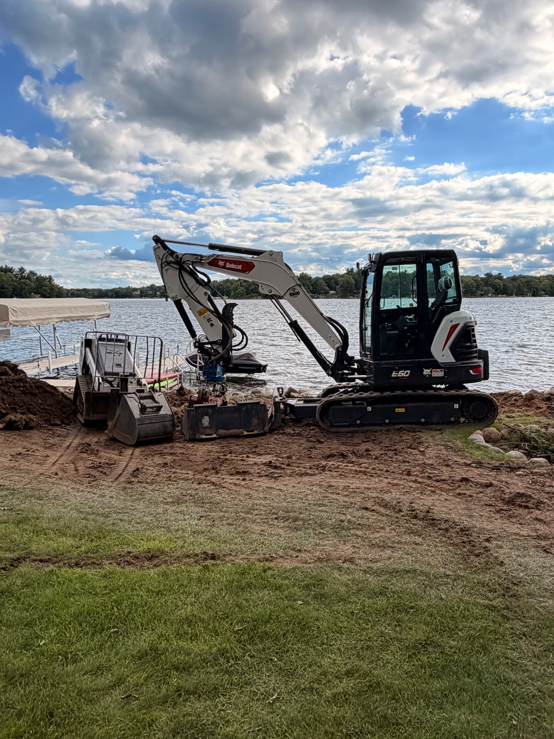 Gallery photos for Lakefront Shoreline Restoration with Natural Boulders in Amory: Image #7
