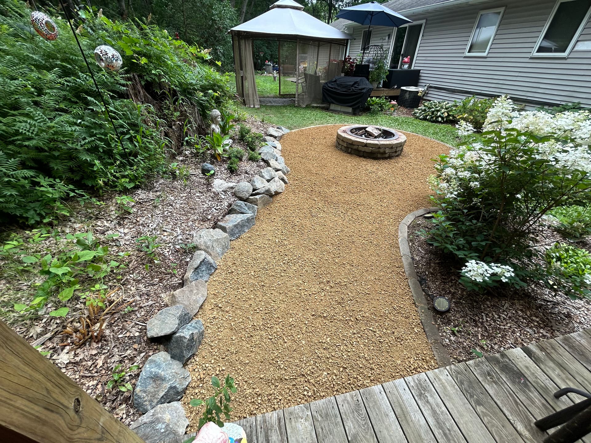 Gallery photos for Fire Pit Area Facelift with Blue Granite Boulders and Fresh Gravel: Image #2