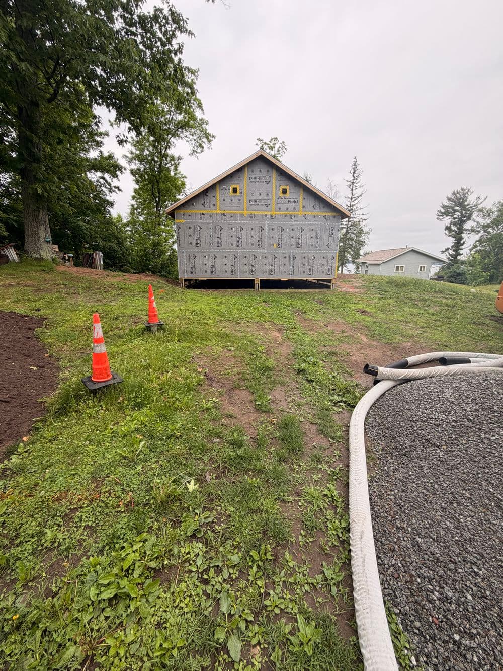 Gallery photos for Full Landscaping Overhaul with Boulder Walls and Gravel Driveway in Luck, WI: Image #3