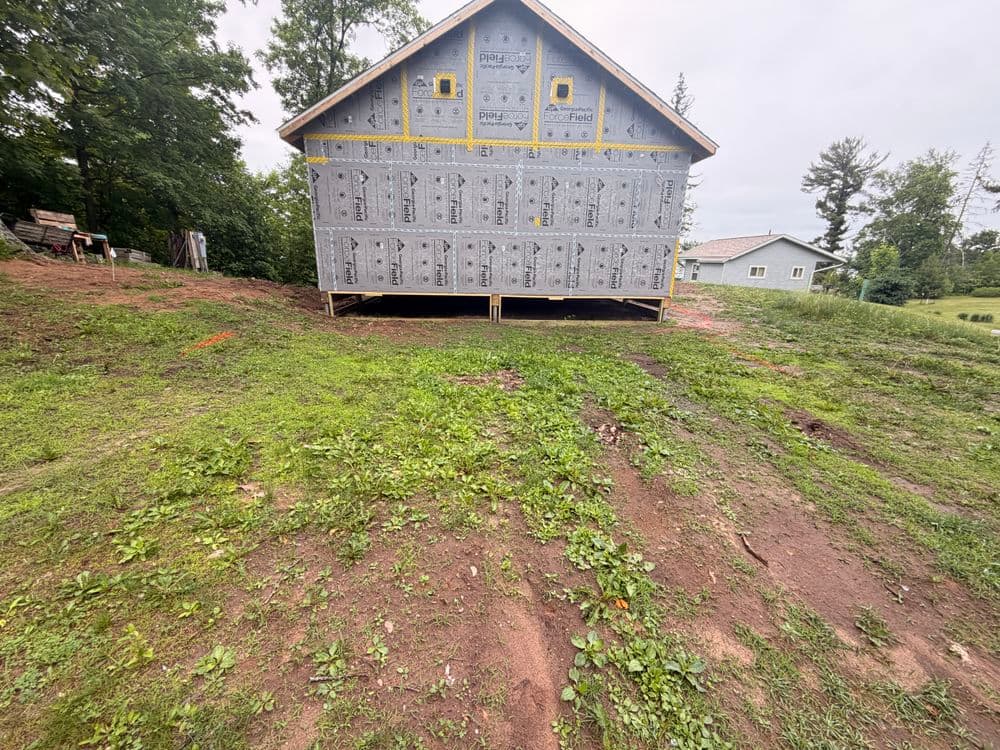 Gallery photos for Full Landscaping Overhaul with Boulder Walls and Gravel Driveway in Luck, WI: Image #2