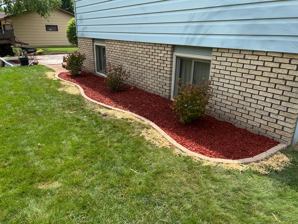Gallery photos for Small Garden Bed Refresh with New Edging, Shrubs, and Mulch: Image #5